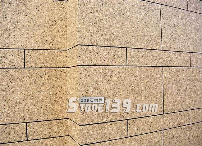 外墻裝飾選石材干掛還是真石漆？