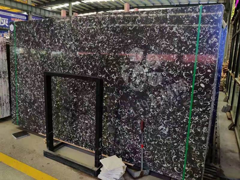 貴陽機(jī)場廁所洗手臺化石是哪個石材（海貝花大理石）